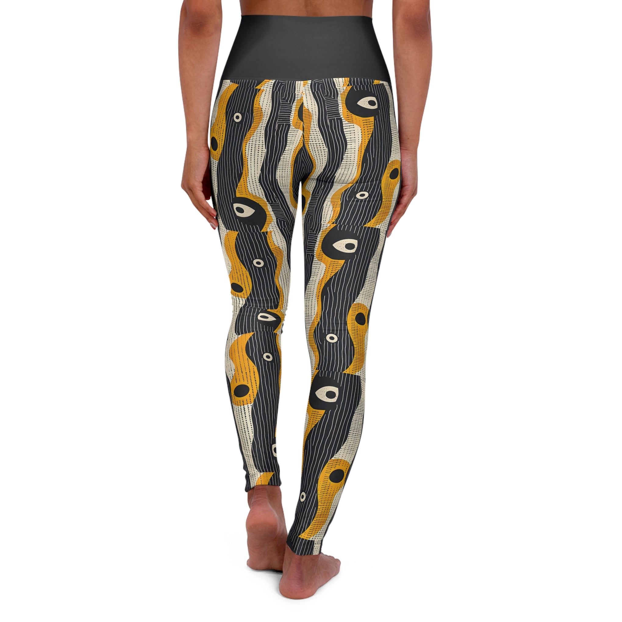 Unleash Your Inner Warrior: The Tribal Muse High-Waisted Yoga Leggings (AOP)