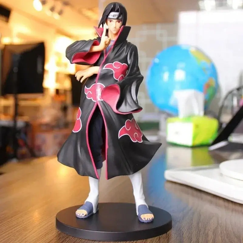 A high-quality Uchiha Itachi Action Figure from Naruto Shippuden, featuring the Akatsuki Organization cloak and GK PVC dress-up design elements.