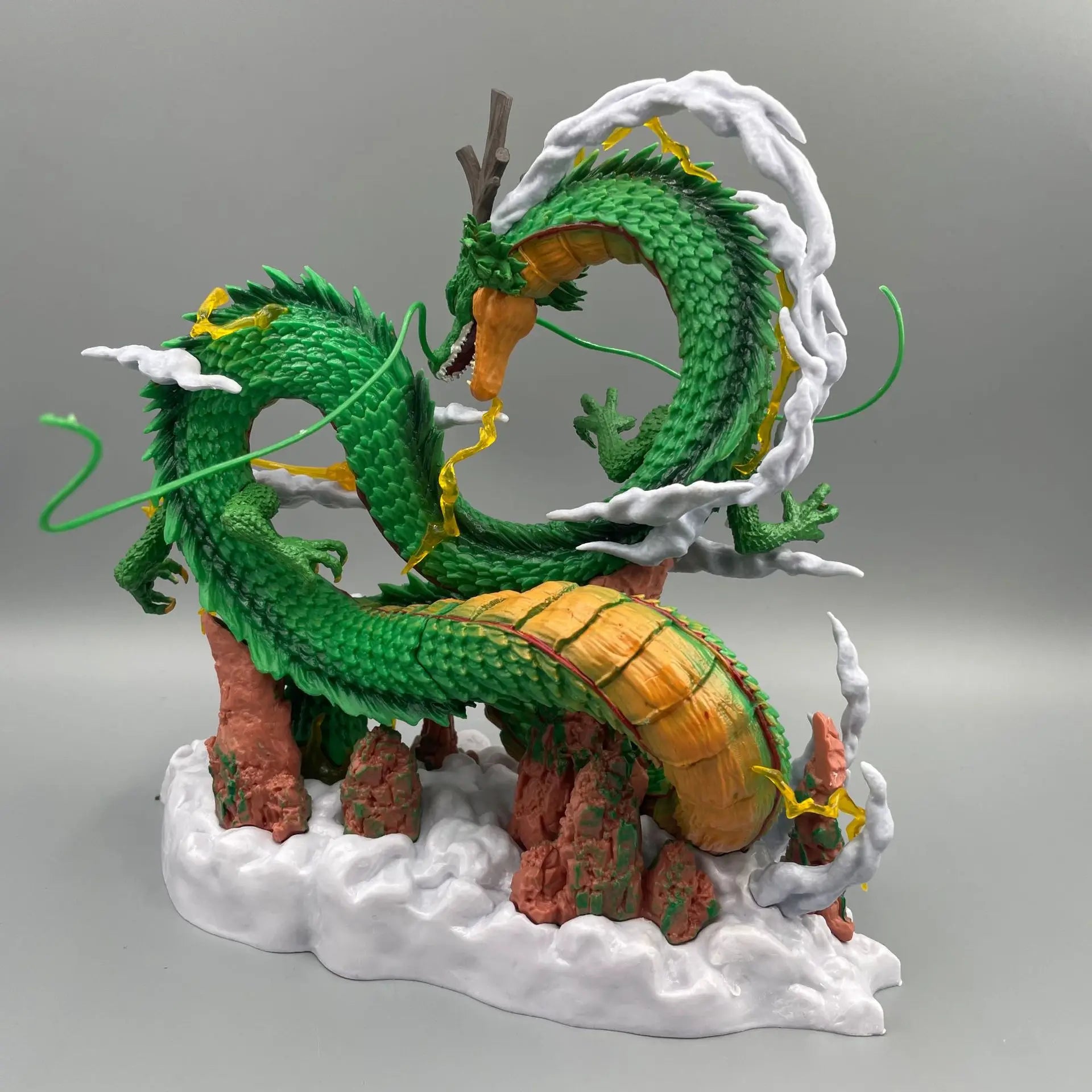 A 24cm Dragon Ball Shenron Figure made of high-quality PVC, featuring Son Goku standing with the Eternal Dragon, ideal for anime room decoration.