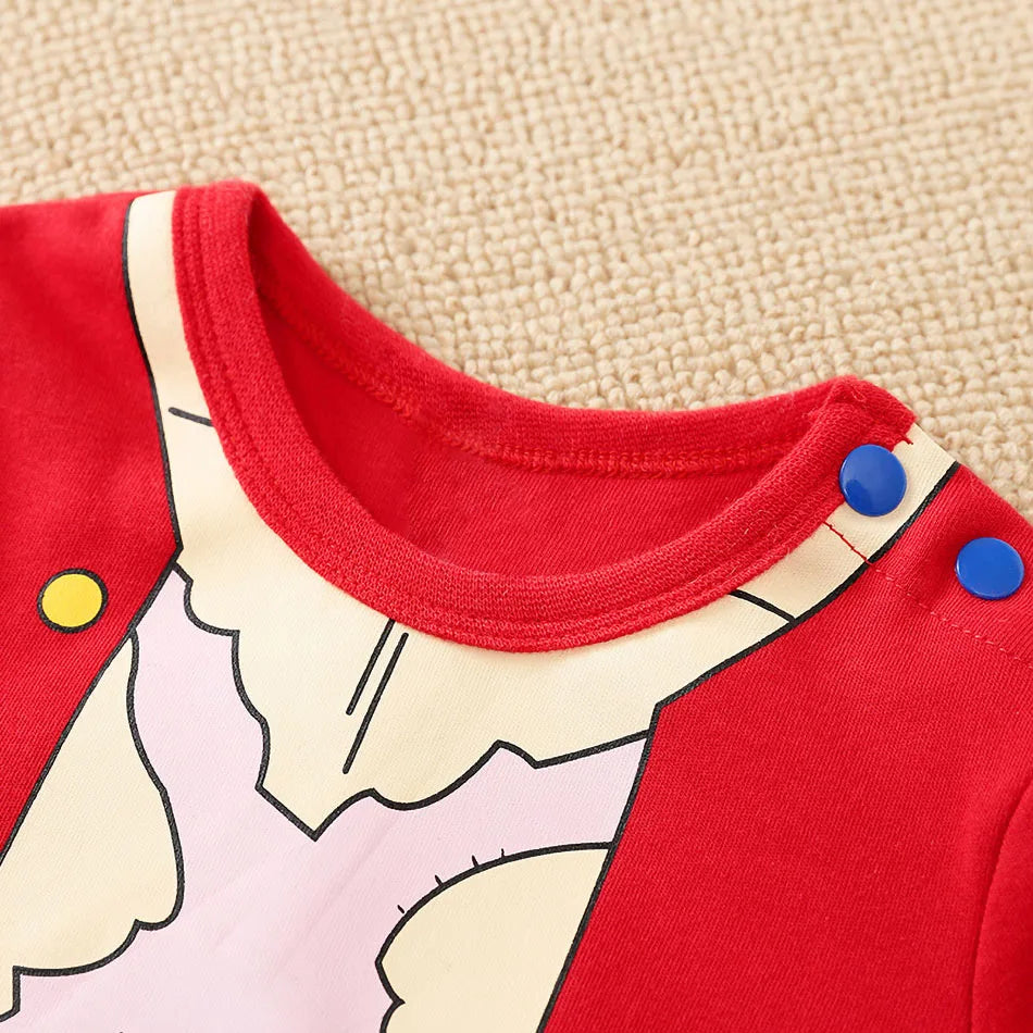 A newborn infant wearing the Baby Anime Costume, a cosplay jumpsuit available in Luffy, Akatsuki, and Vegeta styles.