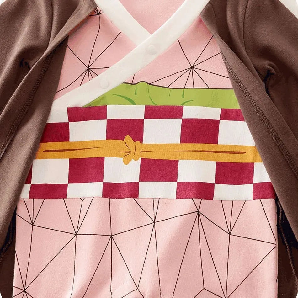 A newborn infant wearing one of the Anime Baby Rompers, a cosplay costume available in Akatsuki, Nezuko, and Tanjirou styles.