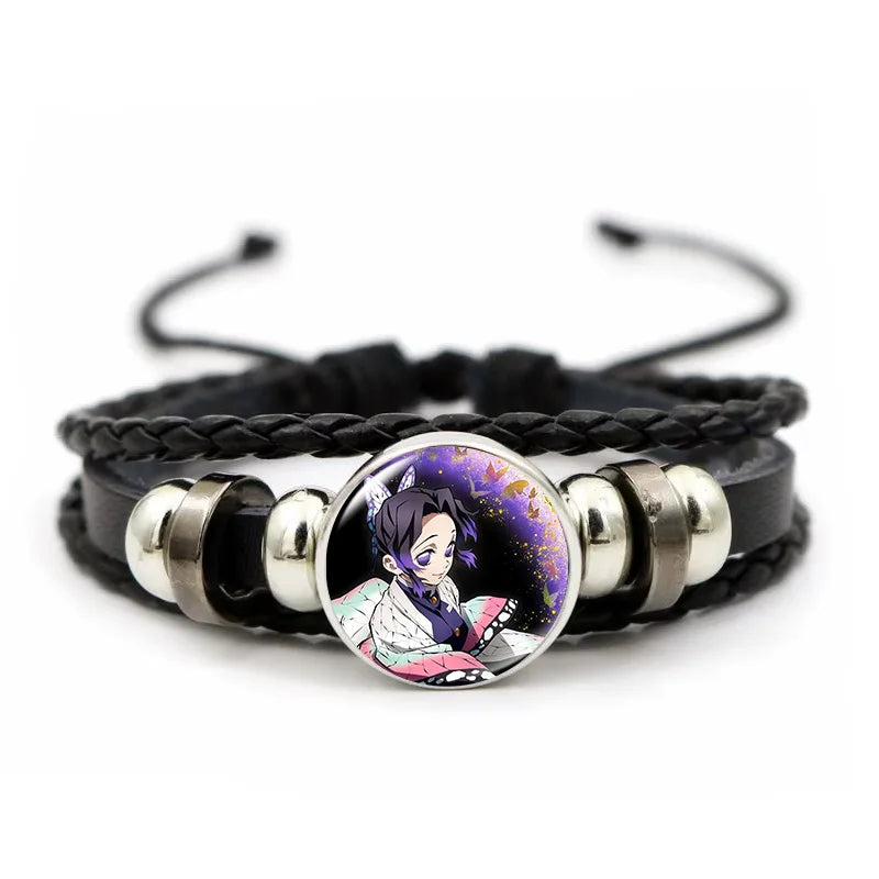 A woven leather Demon Slayer Bracelet featuring a glass art photo charm of Tanjiro Kamado and Nezuko, designed as an anime accessory for fans.