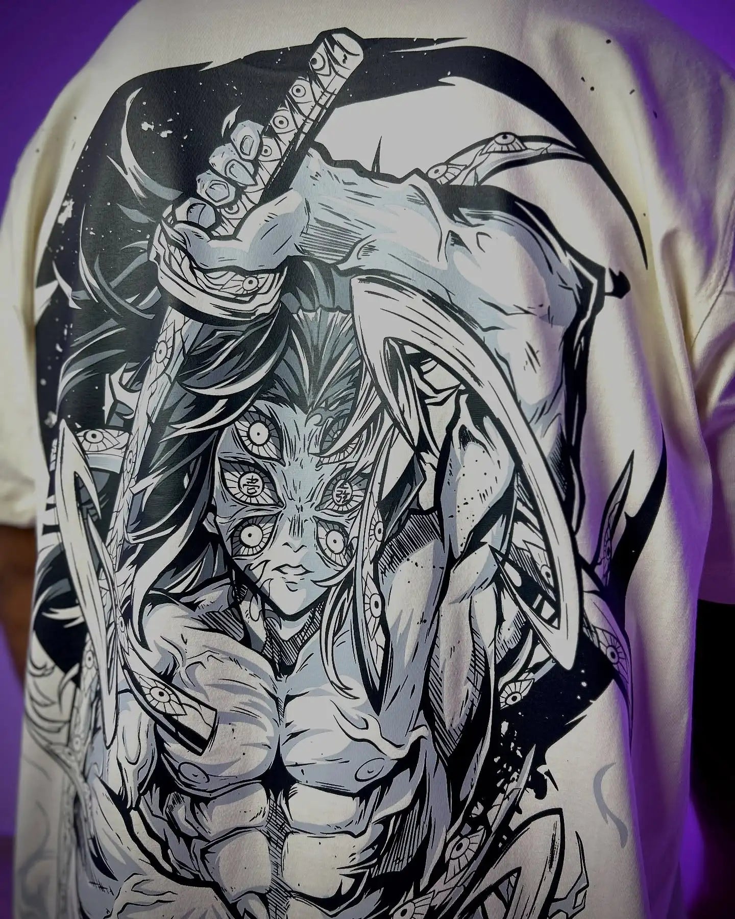 A couple wearing matching oversized Demon Slayer Graphic T Shirts in a hip hop, Y2K streetwear style.