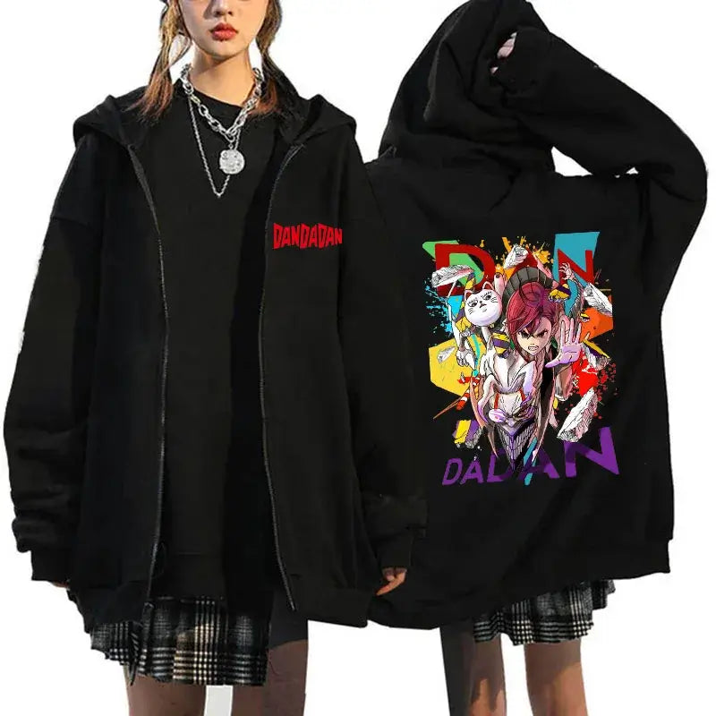 A youthful female model wearing the funny designer Dandadan Okarun Zip Up Hoodie with an anime and manga print.