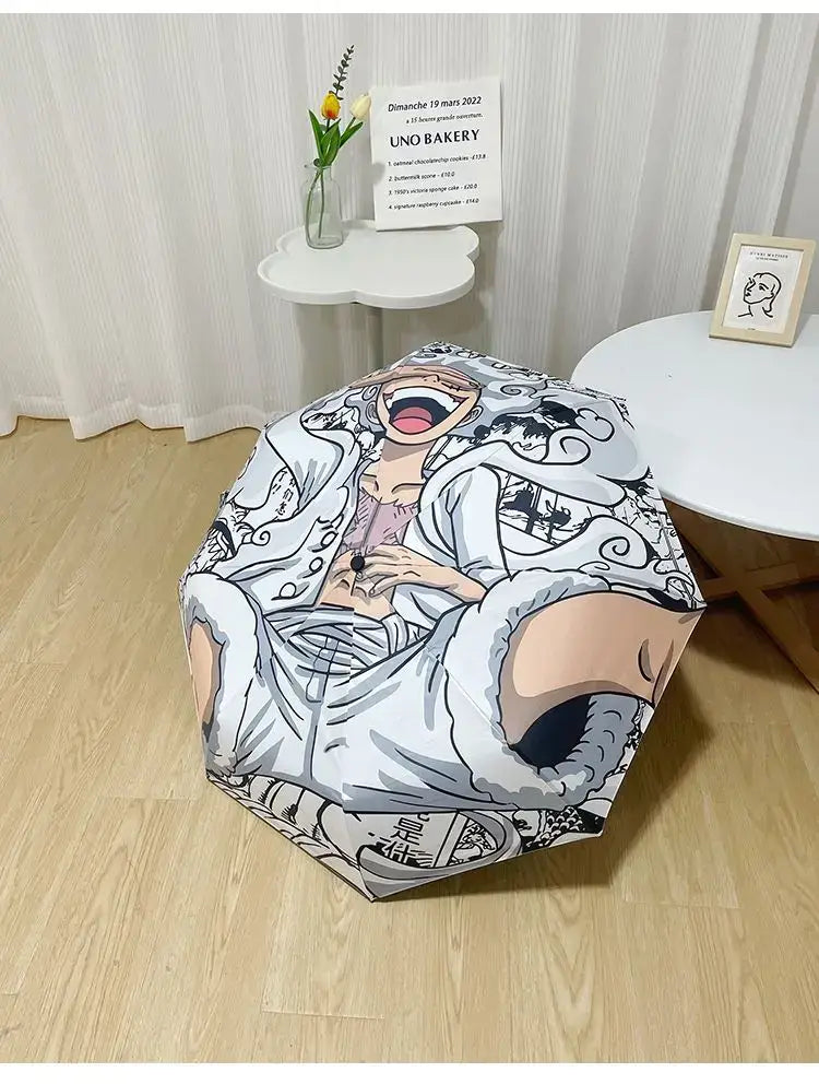 An automatic One Piece Nika Luffy Fold Umbrella with a three-fold design, featuring Gear 5 anime art and black glue sunscreen.