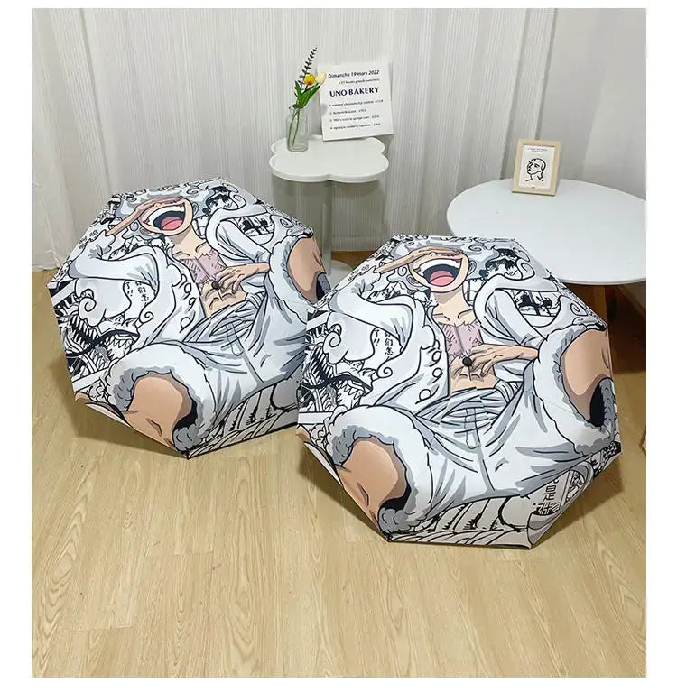 An automatic One Piece Nika Luffy Fold Umbrella with a three-fold design, featuring Gear 5 anime art and black glue sunscreen.