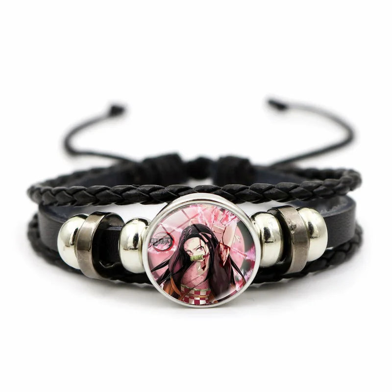 A woven leather Demon Slayer Bracelet featuring a glass art photo charm of Tanjiro Kamado and Nezuko, designed as an anime accessory for fans.