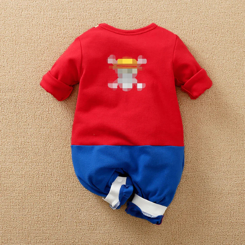 A newborn infant wearing the Baby Anime Costume, a cosplay jumpsuit available in Luffy, Akatsuki, and Vegeta styles.