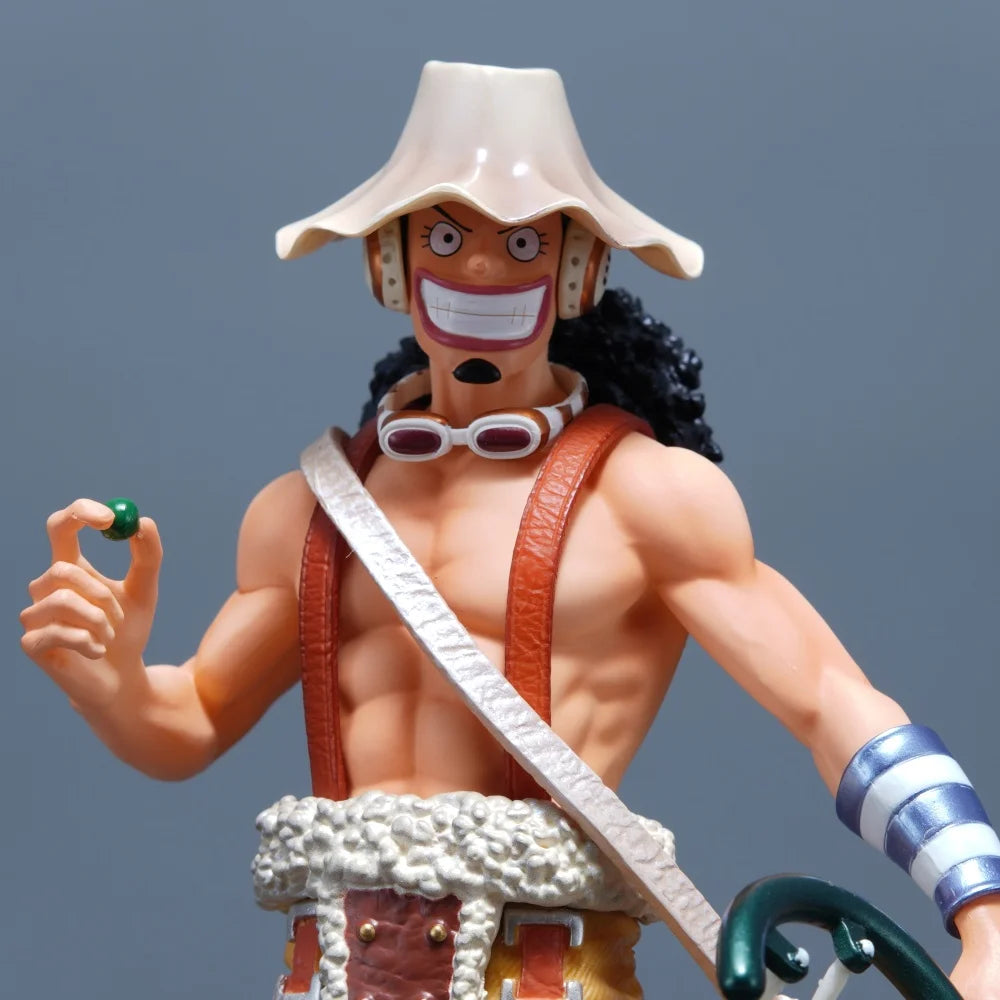 A detailed 25cm One Piece Usopp Figure made of PVC, showcasing the Sniper King in a dynamic pose, ideal for anime desktop decoration.