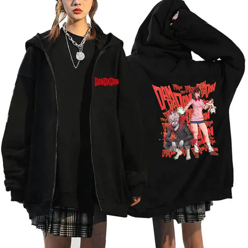 A youthful female model wearing the funny designer Dandadan Okarun Zip Up Hoodie with an anime and manga print.