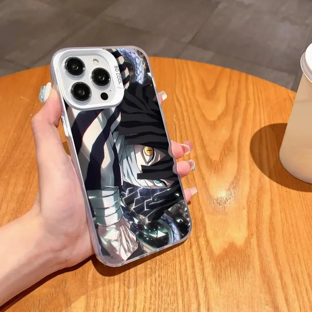 A matte black Demon Slayer Phone Case featuring cool anime character art and shockproof silicone protection for Apple iPhone 16, 15, and 14 Pro Max.