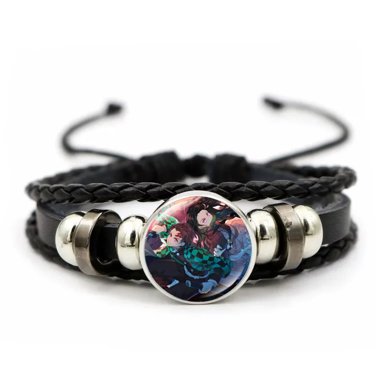 A woven leather Demon Slayer Bracelet featuring a glass art photo charm of Tanjiro Kamado and Nezuko, designed as an anime accessory for fans.