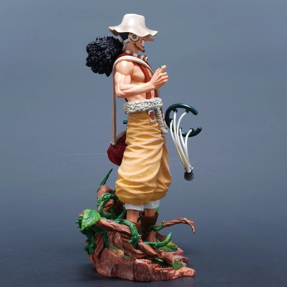 A detailed 25cm One Piece Usopp Figure made of PVC, showcasing the Sniper King in a dynamic pose, ideal for anime desktop decoration.