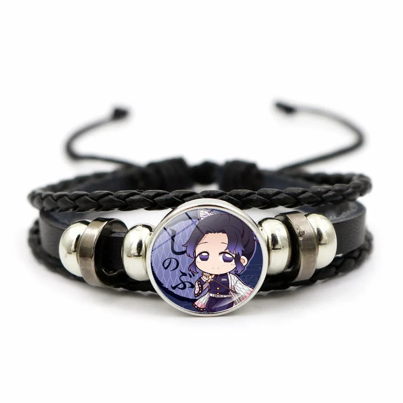 A woven leather Demon Slayer Bracelet featuring a glass art photo charm of Tanjiro Kamado and Nezuko, designed as an anime accessory for fans.