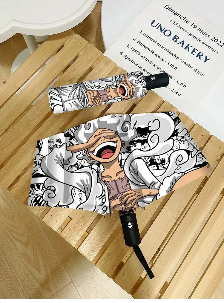 An automatic One Piece Nika Luffy Fold Umbrella with a three-fold design, featuring Gear 5 anime art and black glue sunscreen.