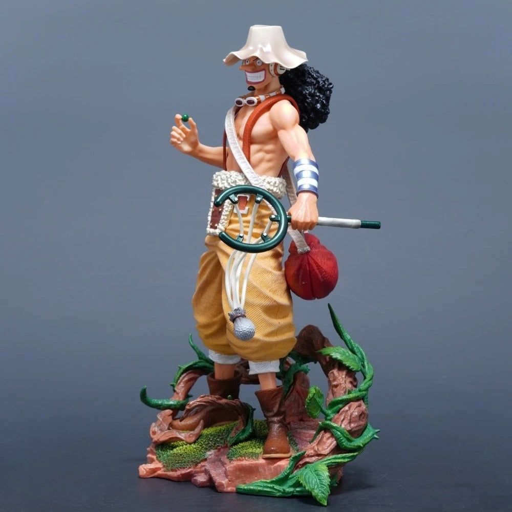 A detailed 25cm One Piece Usopp Figure made of PVC, showcasing the Sniper King in a dynamic pose, ideal for anime desktop decoration.