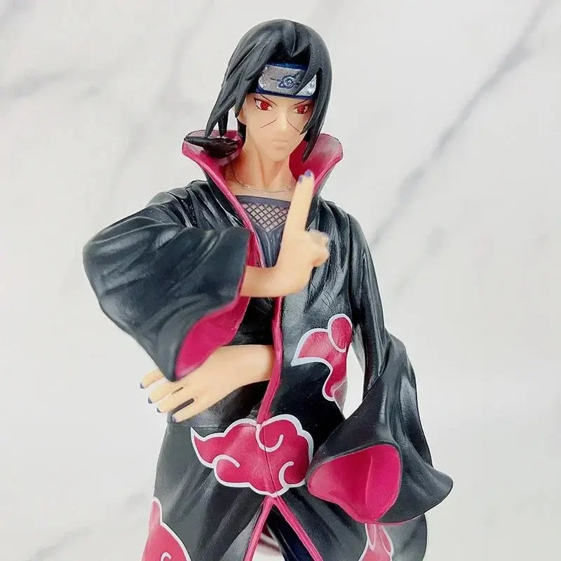 A high-quality Uchiha Itachi Action Figure from Naruto Shippuden, featuring the Akatsuki Organization cloak and GK PVC dress-up design elements.