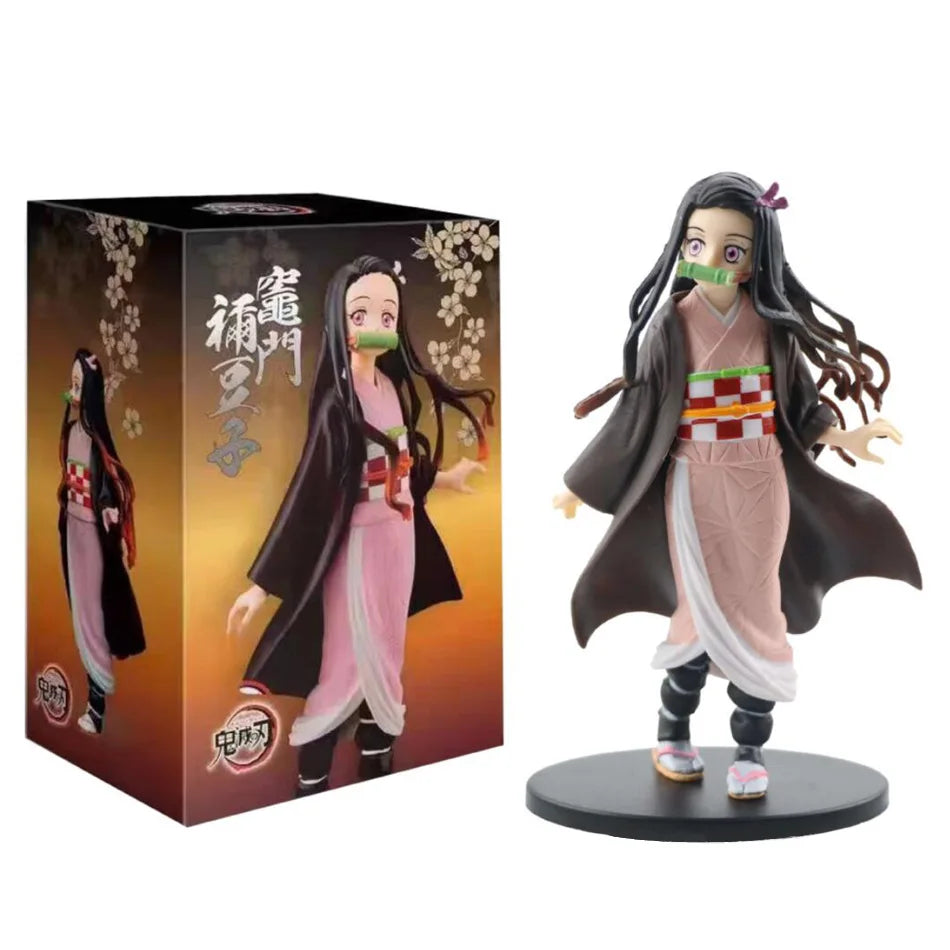 A high-quality Demon Slayer Action Figure PVC model collection featuring Kamado Tanjirou, Agatsuma Zenitsu, and Nezuko in dynamic warrior poses.