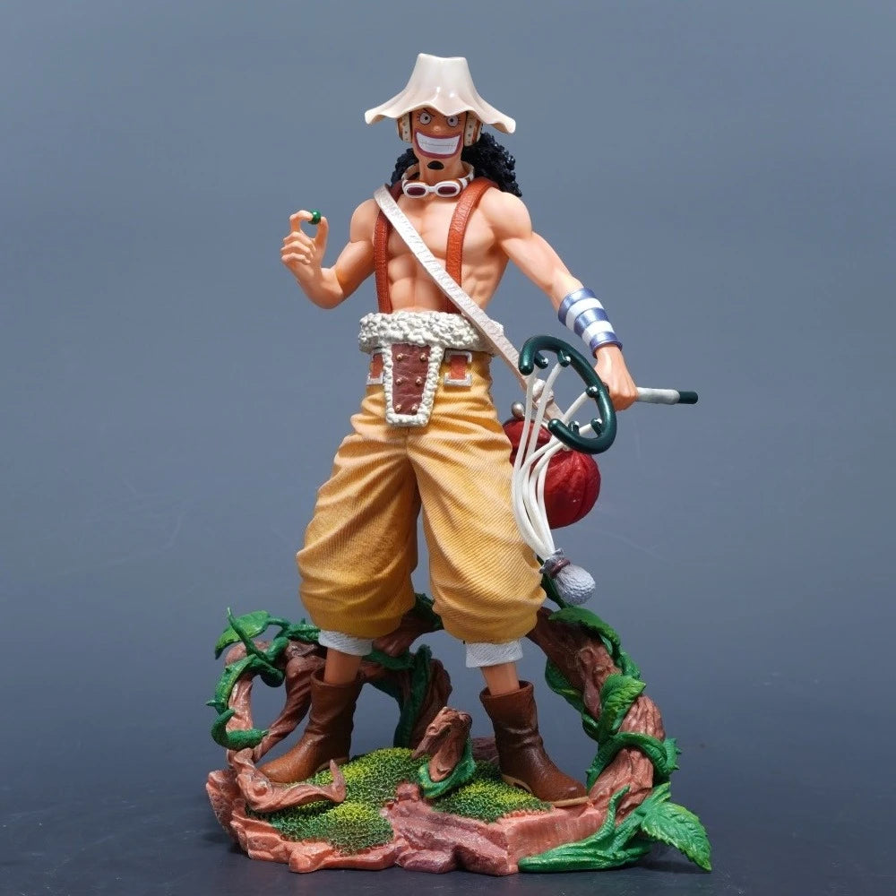 A detailed 25cm One Piece Usopp Figure made of PVC, showcasing the Sniper King in a dynamic pose, ideal for anime desktop decoration.