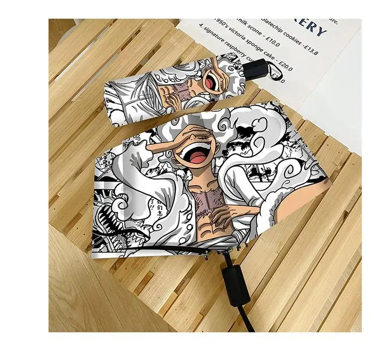 An automatic One Piece Nika Luffy Fold Umbrella with a three-fold design, featuring Gear 5 anime art and black glue sunscreen.