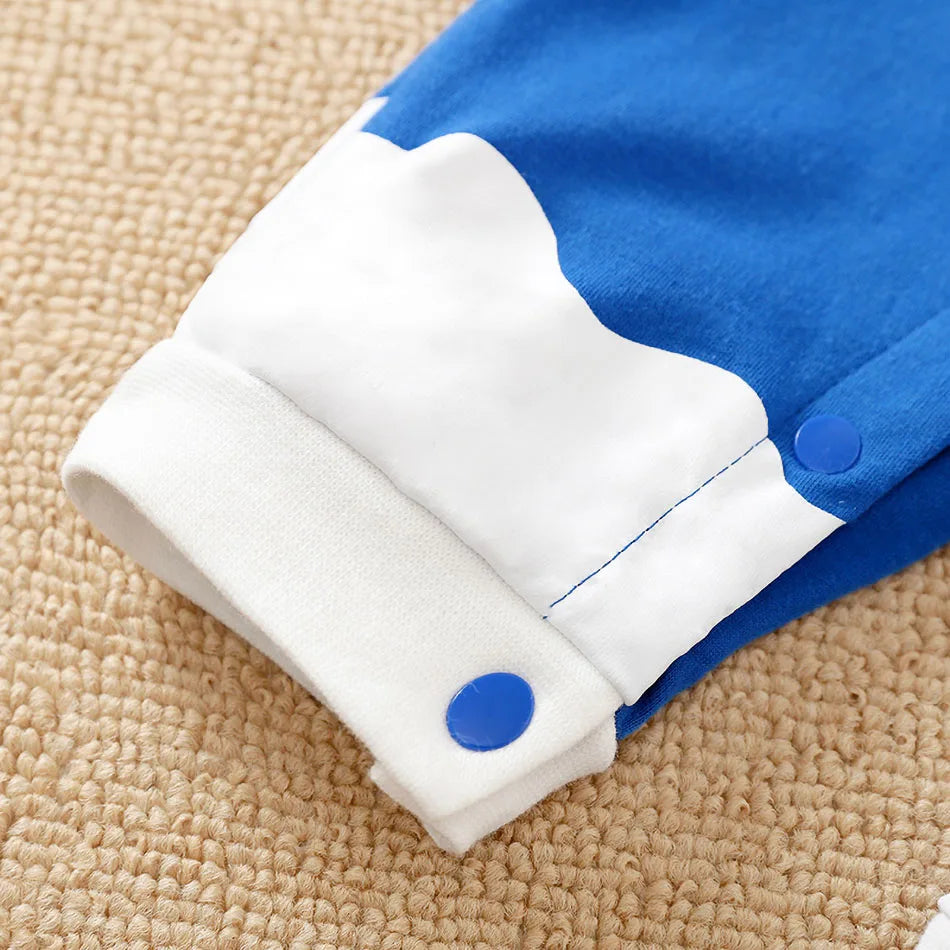 A newborn infant wearing the Baby Anime Costume, a cosplay jumpsuit available in Luffy, Akatsuki, and Vegeta styles.