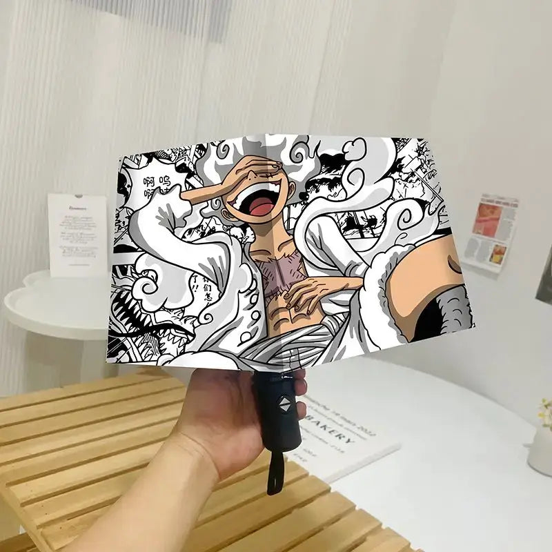 An automatic One Piece Nika Luffy Fold Umbrella with a three-fold design, featuring Gear 5 anime art and black glue sunscreen.