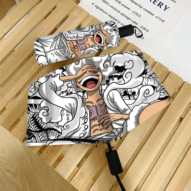 An automatic One Piece Nika Luffy Fold Umbrella with a three-fold design, featuring Gear 5 anime art and black glue sunscreen.
