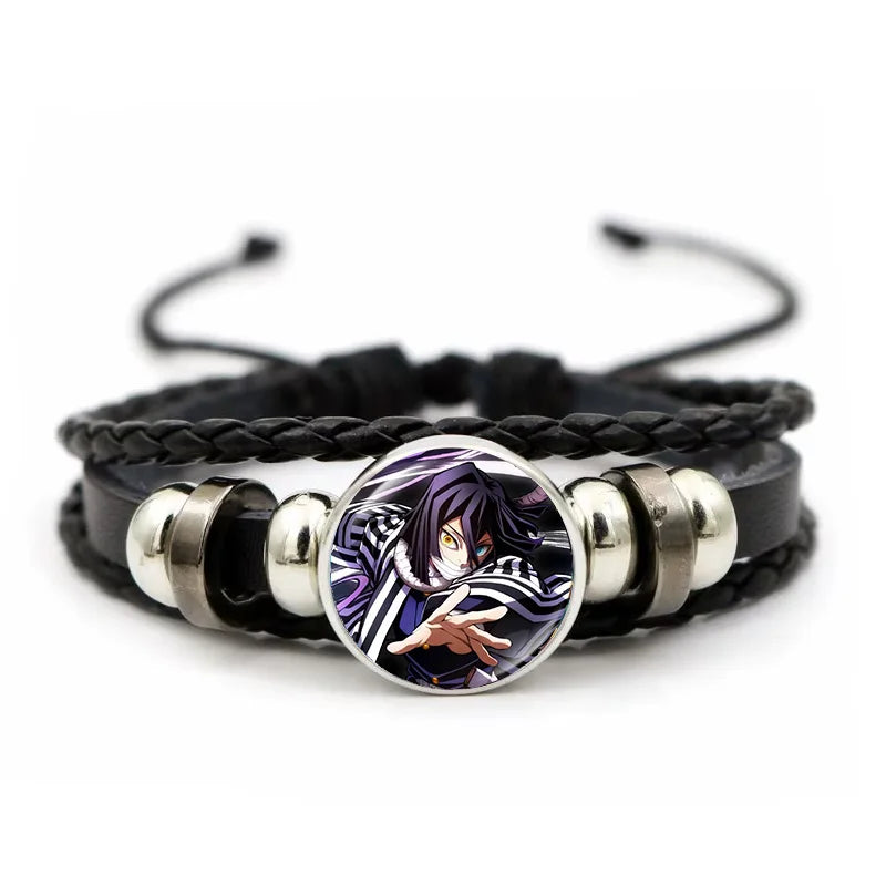 A woven leather Demon Slayer Bracelet featuring a glass art photo charm of Tanjiro Kamado and Nezuko, designed as an anime accessory for fans.