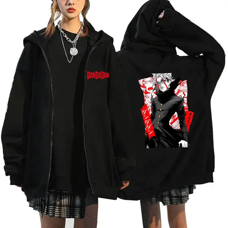 A youthful female model wearing the funny designer Dandadan Okarun Zip Up Hoodie with an anime and manga print.