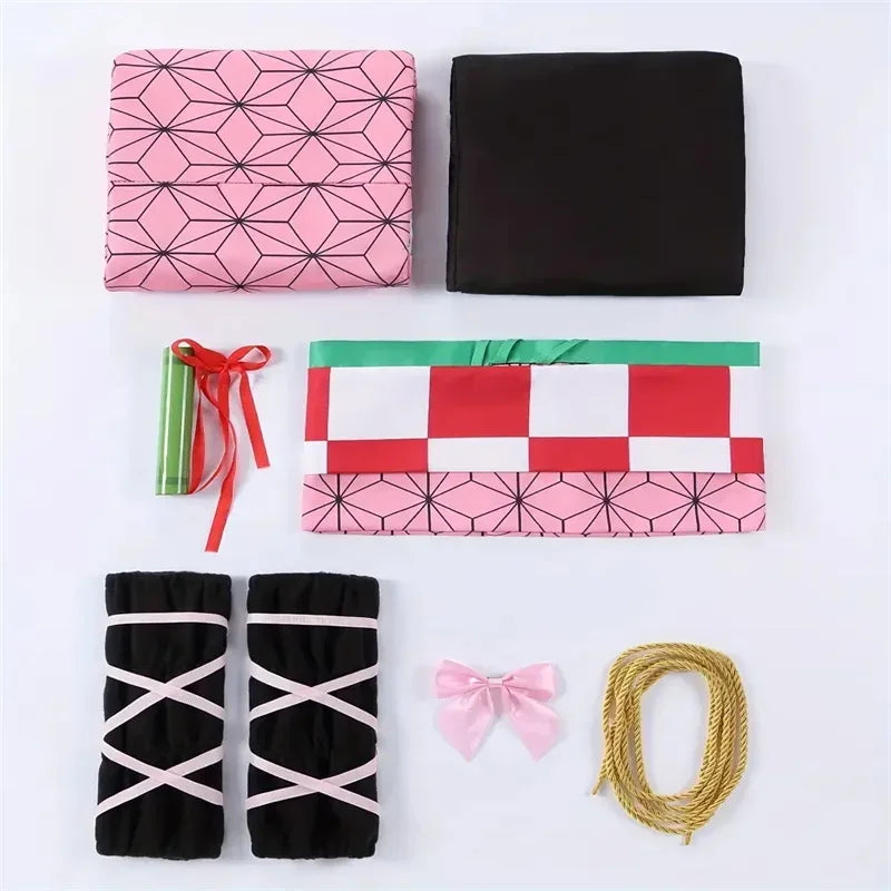 A complete Nezuko Kamado Cosplay Costume featuring the pink hemp-leaf pattern kimono and bamboo muzzle prop for adult Halloween parties.