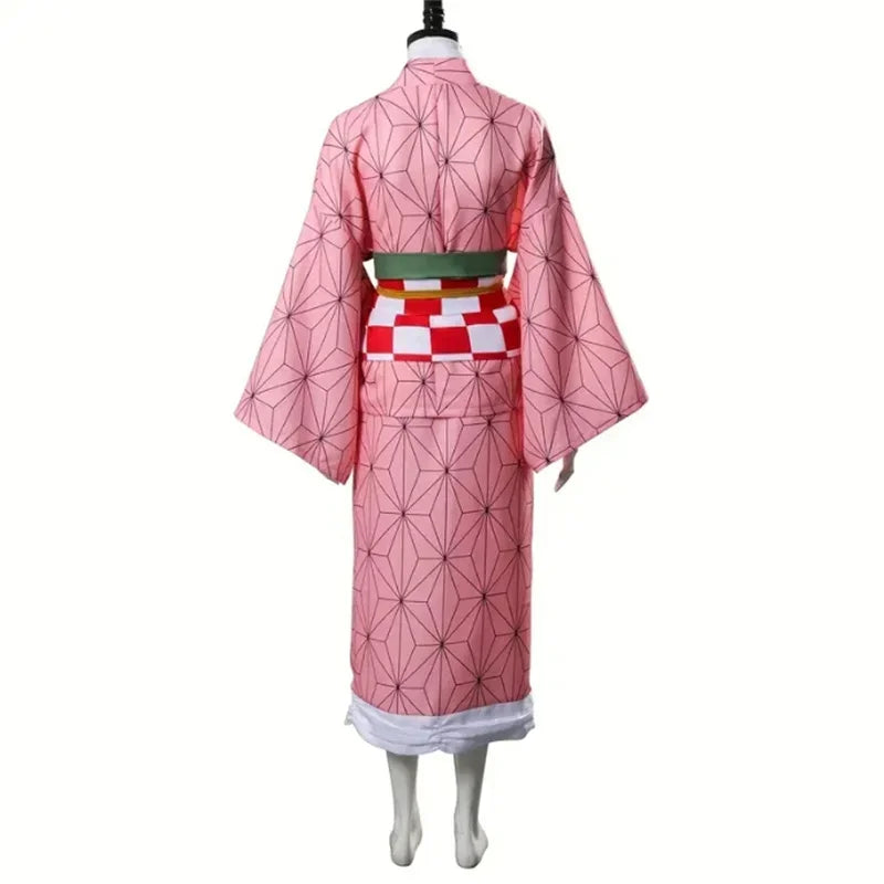 A complete Nezuko Kamado Cosplay Costume featuring the pink hemp-leaf pattern kimono and bamboo muzzle prop for adult Halloween parties.