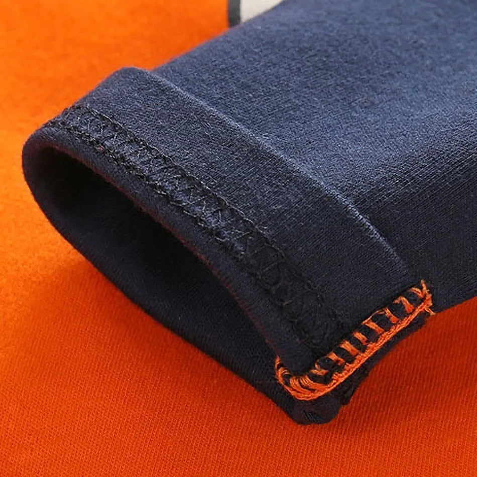 A newborn infant wearing one of the Anime Baby Rompers, a cosplay costume available in Akatsuki, Nezuko, and Tanjirou styles.