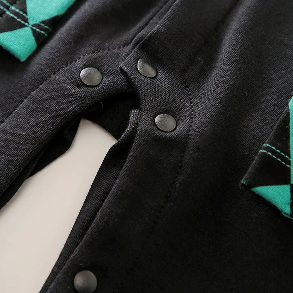 A newborn infant wearing one of the Anime Baby Rompers, a cosplay costume available in Akatsuki, Nezuko, and Tanjirou styles.