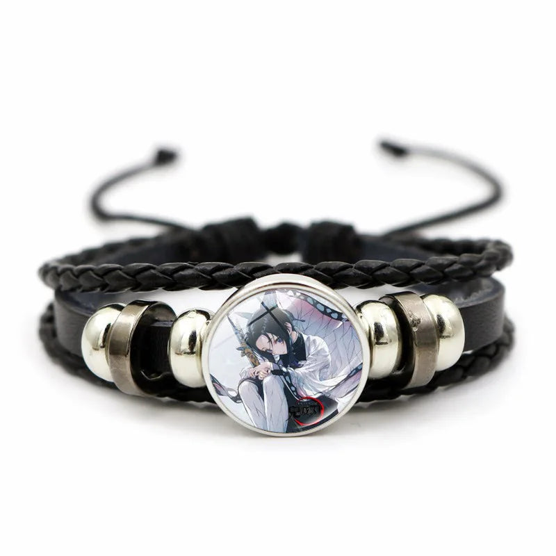 A woven leather Demon Slayer Bracelet featuring a glass art photo charm of Tanjiro Kamado and Nezuko, designed as an anime accessory for fans.