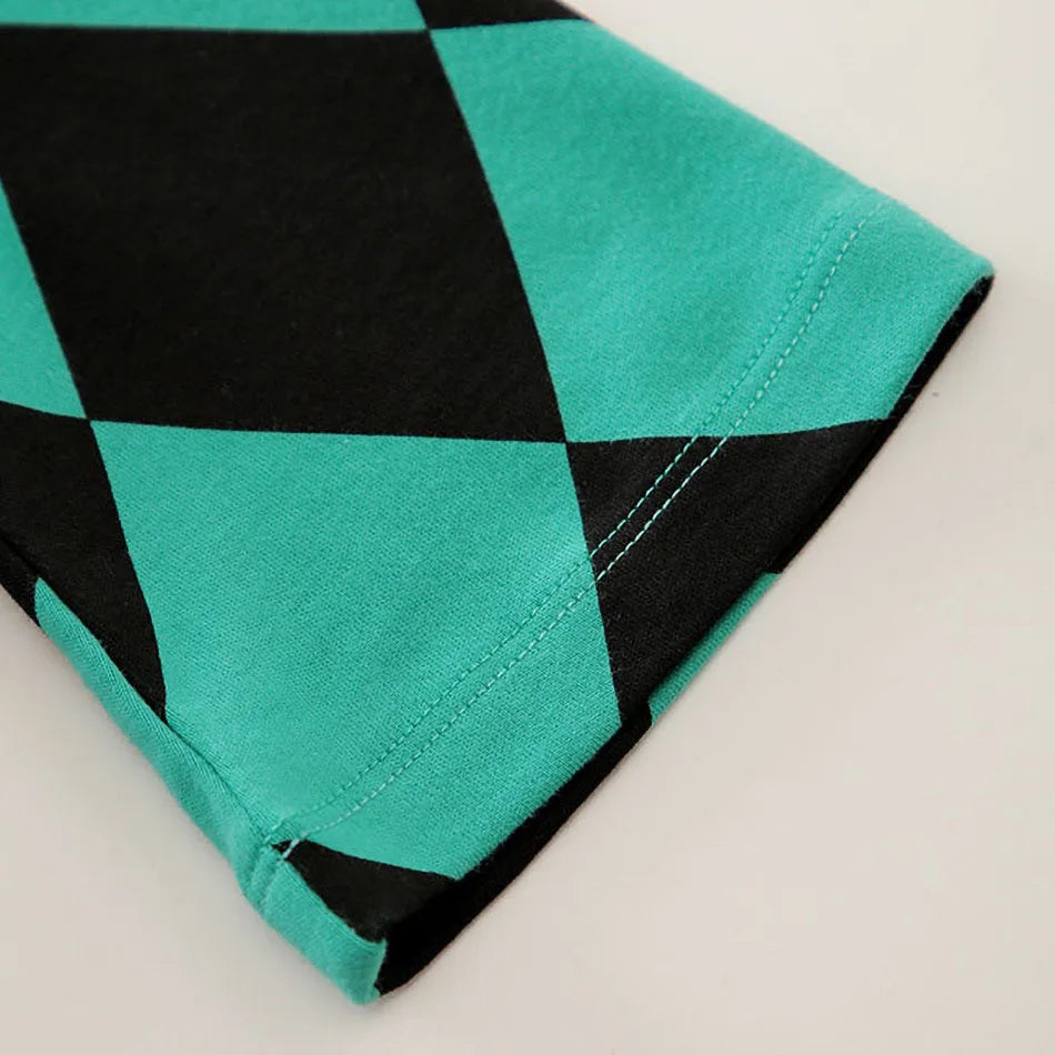 A newborn infant wearing one of the Anime Baby Rompers, a cosplay costume available in Akatsuki, Nezuko, and Tanjirou styles.