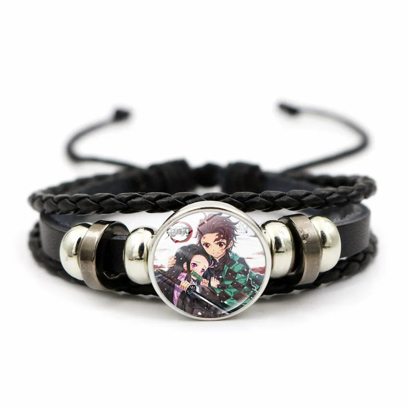 A woven leather Demon Slayer Bracelet featuring a glass art photo charm of Tanjiro Kamado and Nezuko, designed as an anime accessory for fans.