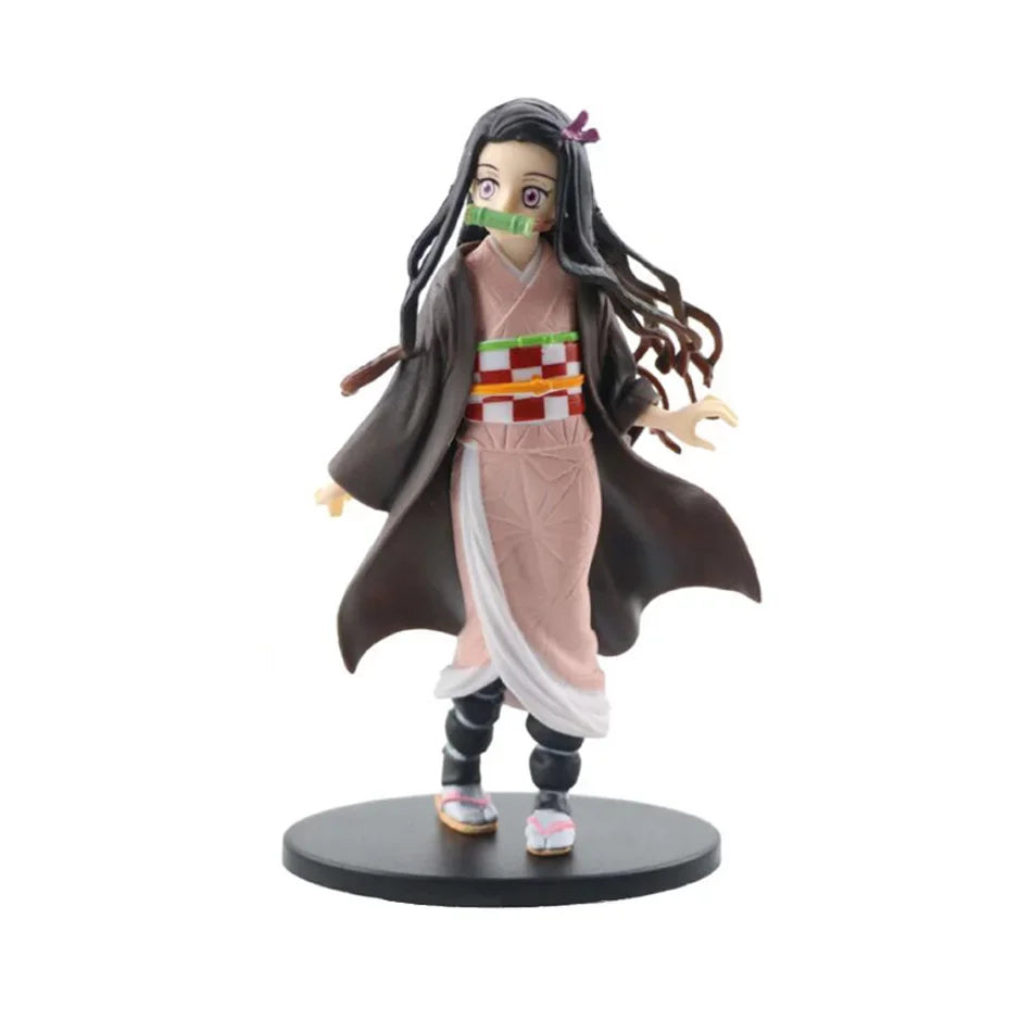 A high-quality Demon Slayer Action Figure PVC model collection featuring Kamado Tanjirou, Agatsuma Zenitsu, and Nezuko in dynamic warrior poses.