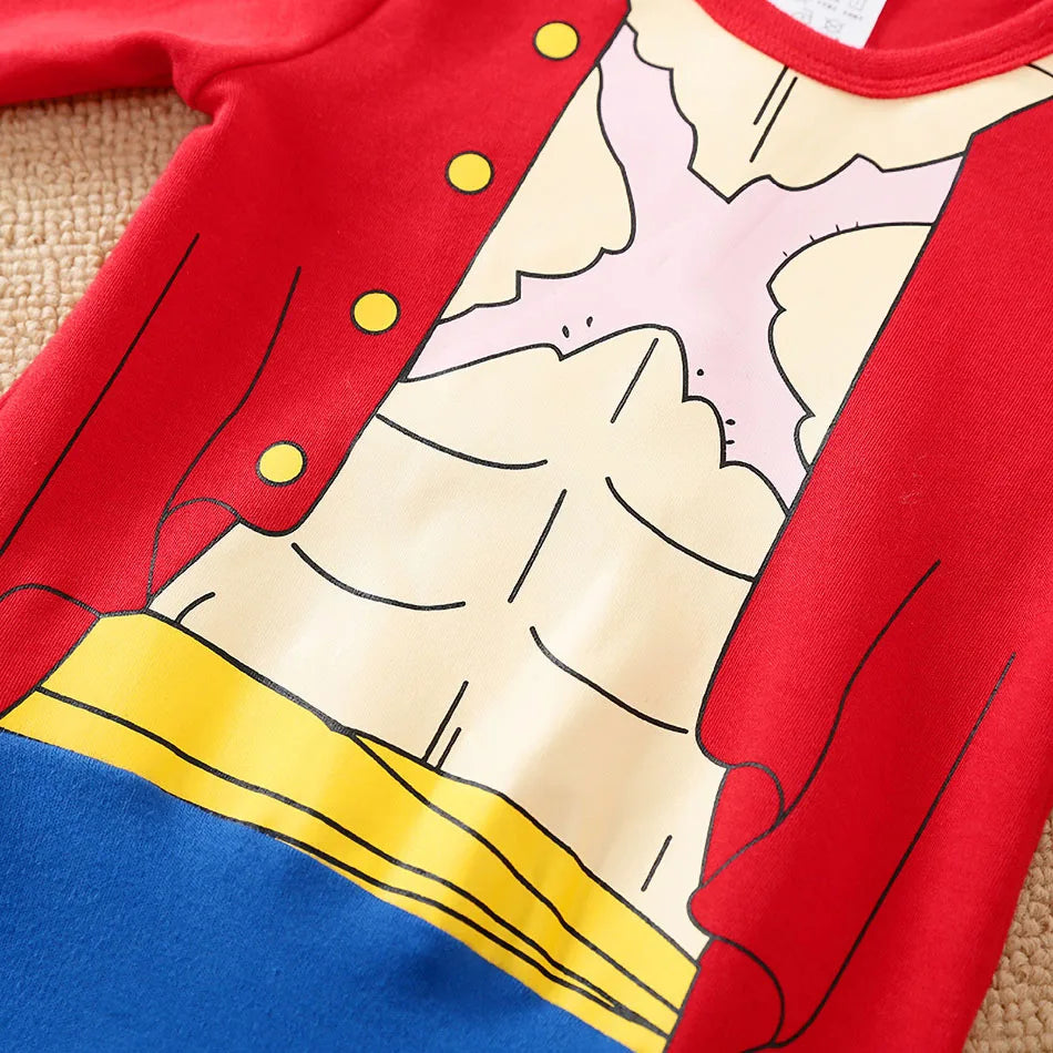 A newborn infant wearing the Baby Anime Costume, a cosplay jumpsuit available in Luffy, Akatsuki, and Vegeta styles.