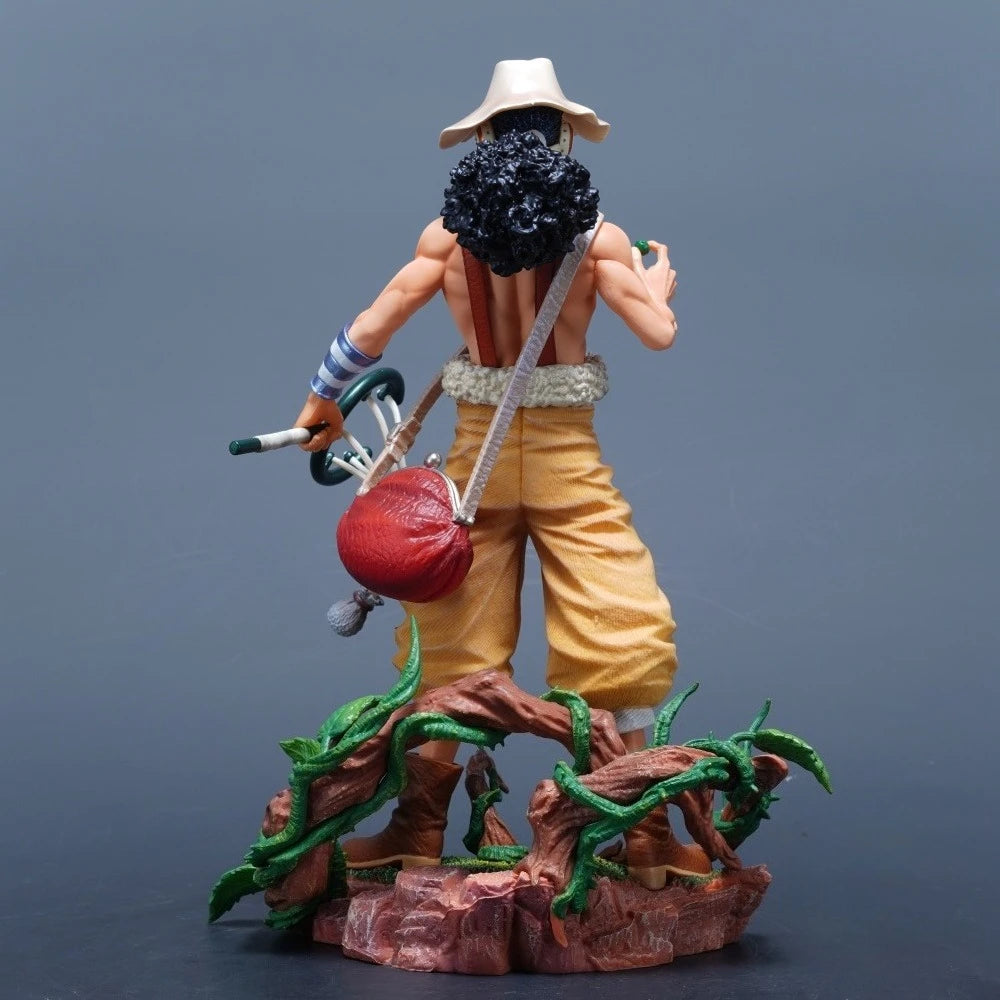 A detailed 25cm One Piece Usopp Figure made of PVC, showcasing the Sniper King in a dynamic pose, ideal for anime desktop decoration.