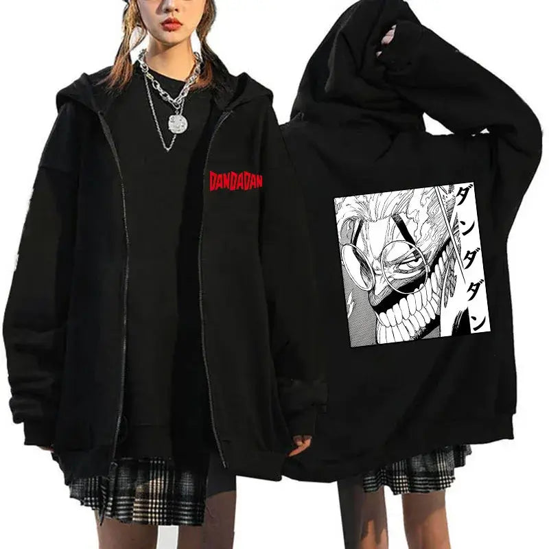 A youthful female model wearing the funny designer Dandadan Okarun Zip Up Hoodie with an anime and manga print.