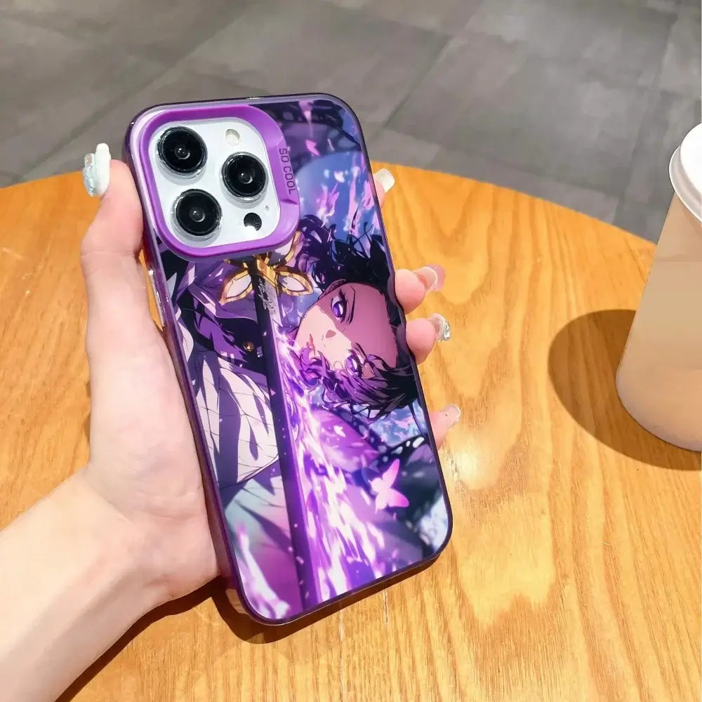 A matte black Demon Slayer Phone Case featuring cool anime character art and shockproof silicone protection for Apple iPhone 16, 15, and 14 Pro Max.