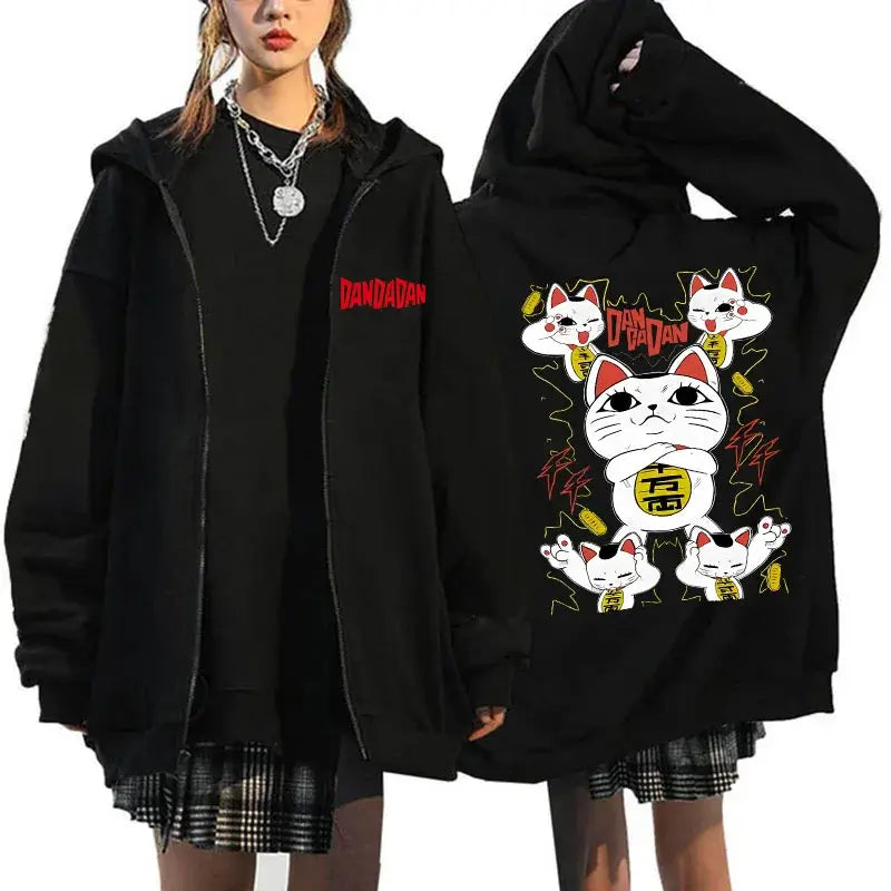 A youthful female model wearing the funny designer Dandadan Okarun Zip Up Hoodie with an anime and manga print.