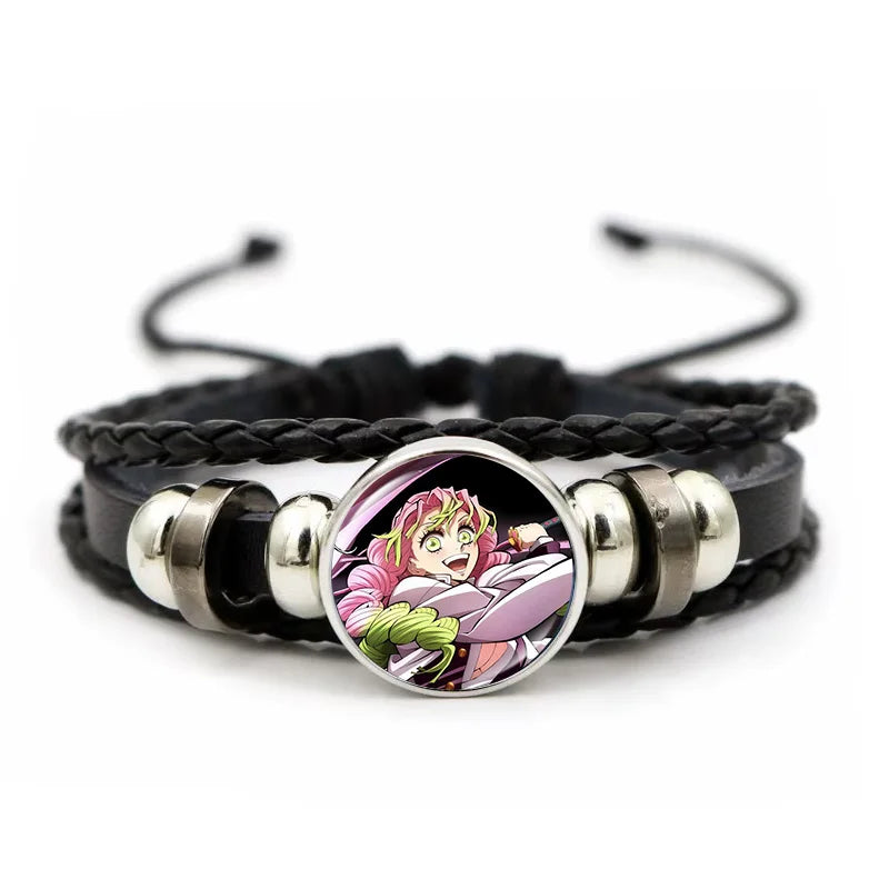 A woven leather Demon Slayer Bracelet featuring a glass art photo charm of Tanjiro Kamado and Nezuko, designed as an anime accessory for fans.