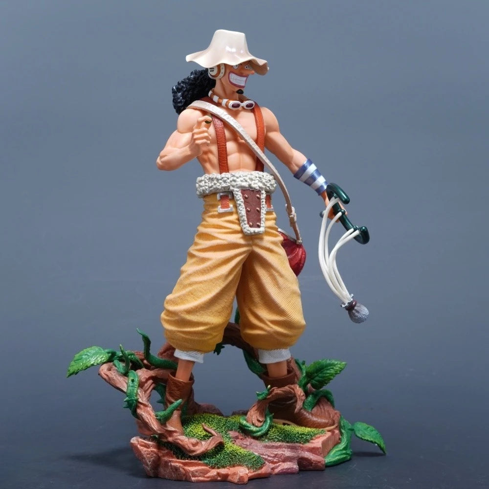 A detailed 25cm One Piece Usopp Figure made of PVC, showcasing the Sniper King in a dynamic pose, ideal for anime desktop decoration.