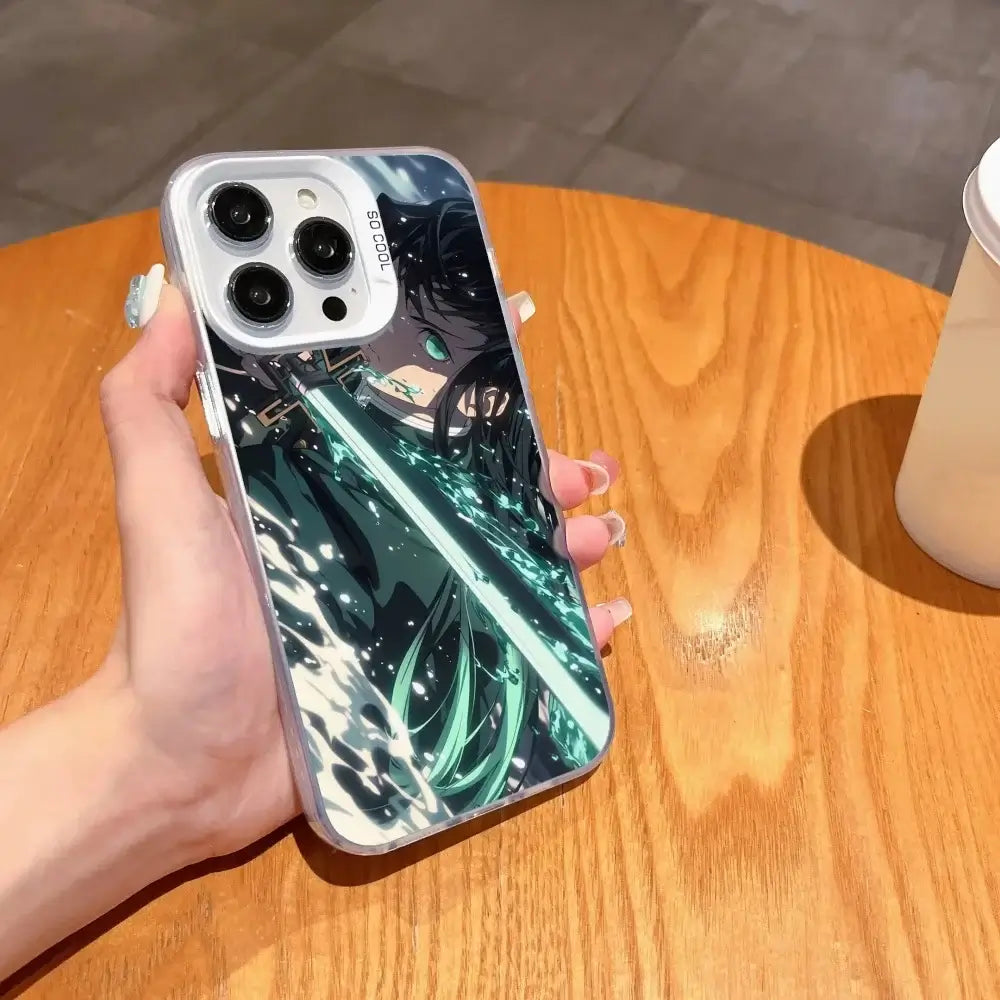 A matte black Demon Slayer Phone Case featuring cool anime character art and shockproof silicone protection for Apple iPhone 16, 15, and 14 Pro Max.