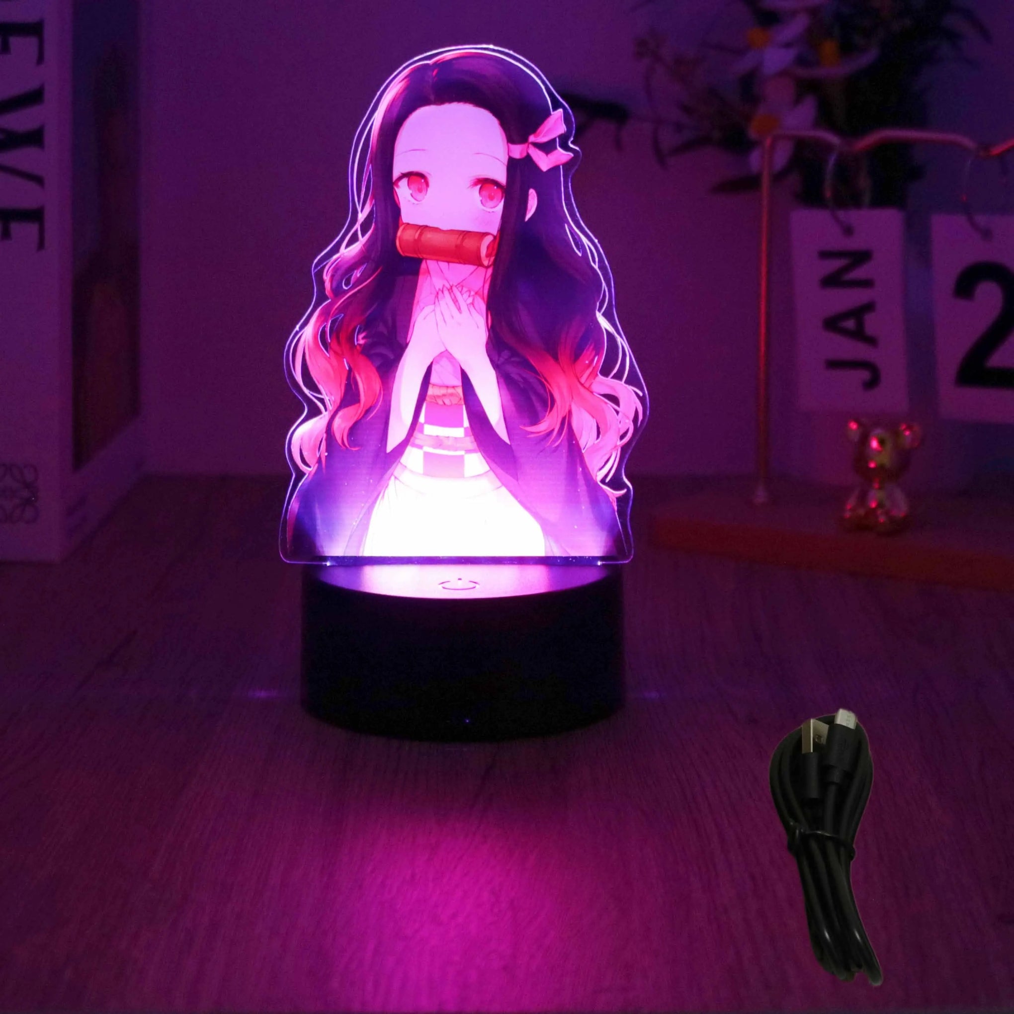 A glowing Demon Slayer 3D Lamp featuring an acrylic Tanjiro and Nezuko figure design, illuminated in blue LED light for bedroom decor.