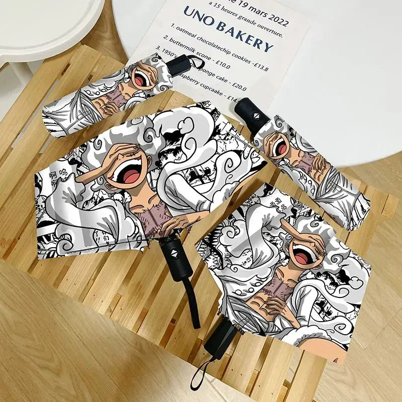 An automatic One Piece Nika Luffy Fold Umbrella with a three-fold design, featuring Gear 5 anime art and black glue sunscreen.