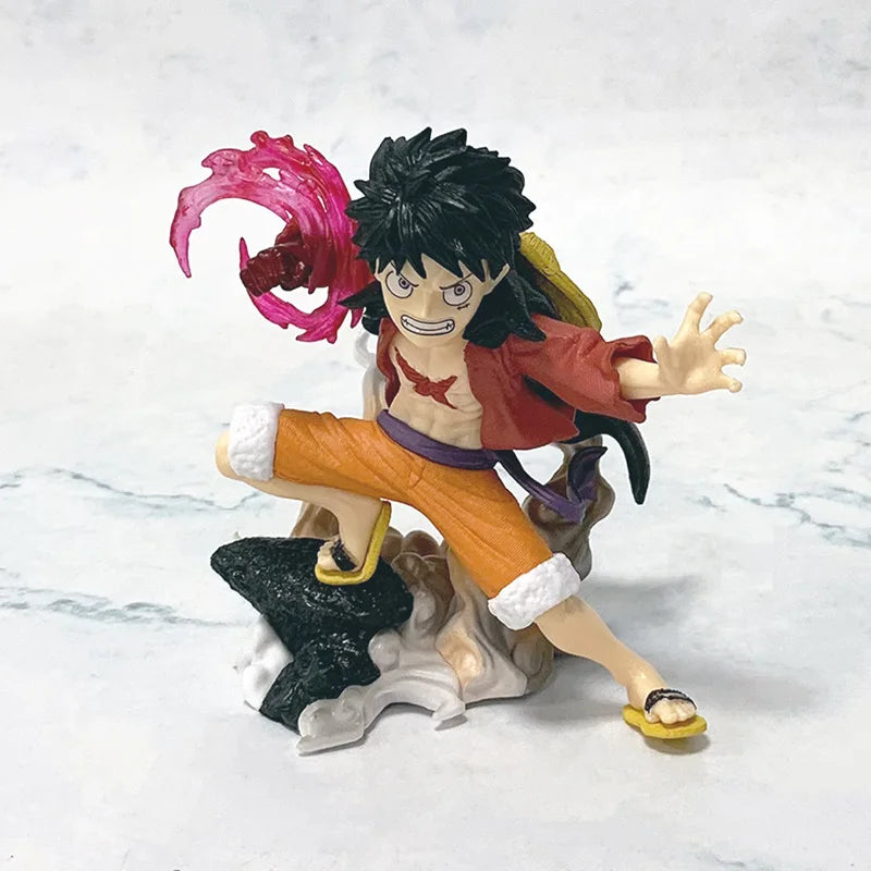 A 10cm One Piece Luffy Figures statue featuring Monkey D. Luffy with a Flowing Cherry Blossom Sakura theme, made of PVC for anime collections.