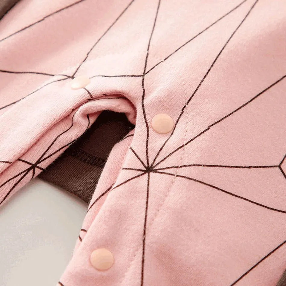 A newborn infant wearing one of the Anime Baby Rompers, a cosplay costume available in Akatsuki, Nezuko, and Tanjirou styles.